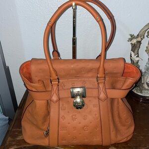 Brown leather Lancel Daligramme handbag